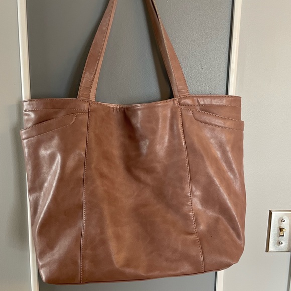 21x24x7 inches. Soft, buttery vegan leather. Beige with a hint of pink. - Picture 3 of 3